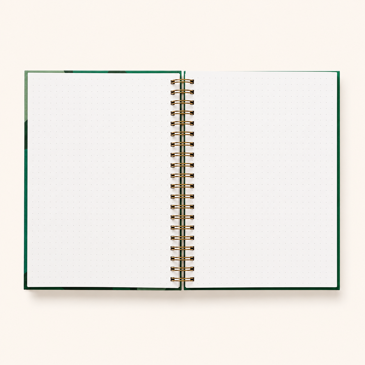 Close-up of the gold metal spiral binding on The Chronicles Statement notebook
